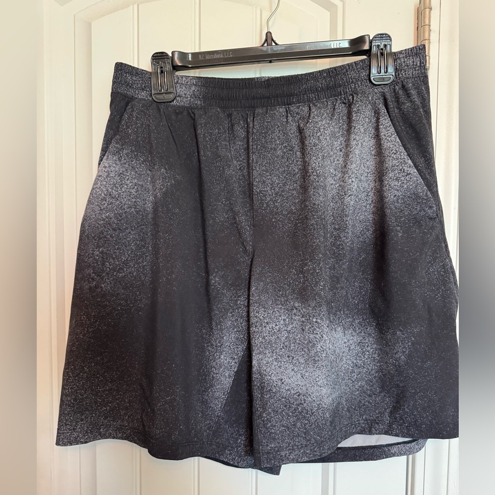 Lululemon Men’s Pace Breaker 9 inch non-lined shorts. Black with white coloring.